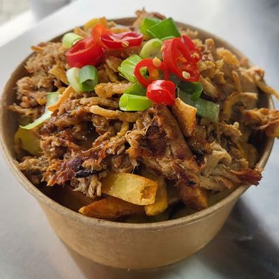 Loaded fries topped with pulled pork, chilli and spring onion